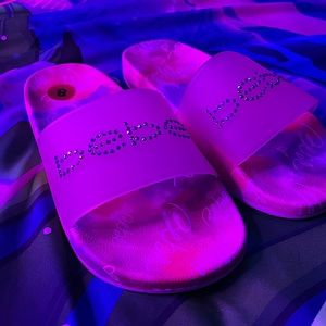 PARTIALLY WORN MULTI COLOR BEBE SLIDES